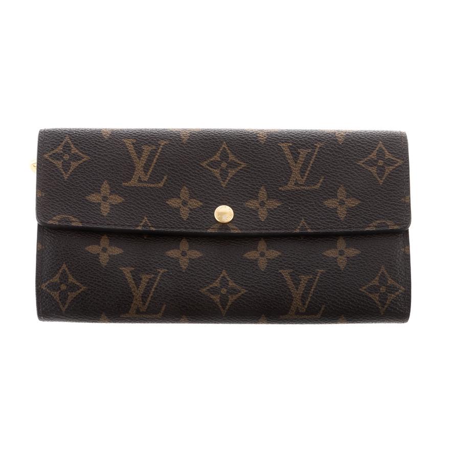 A LOUIS VUITTON MONOGRAM SARAH WALLET